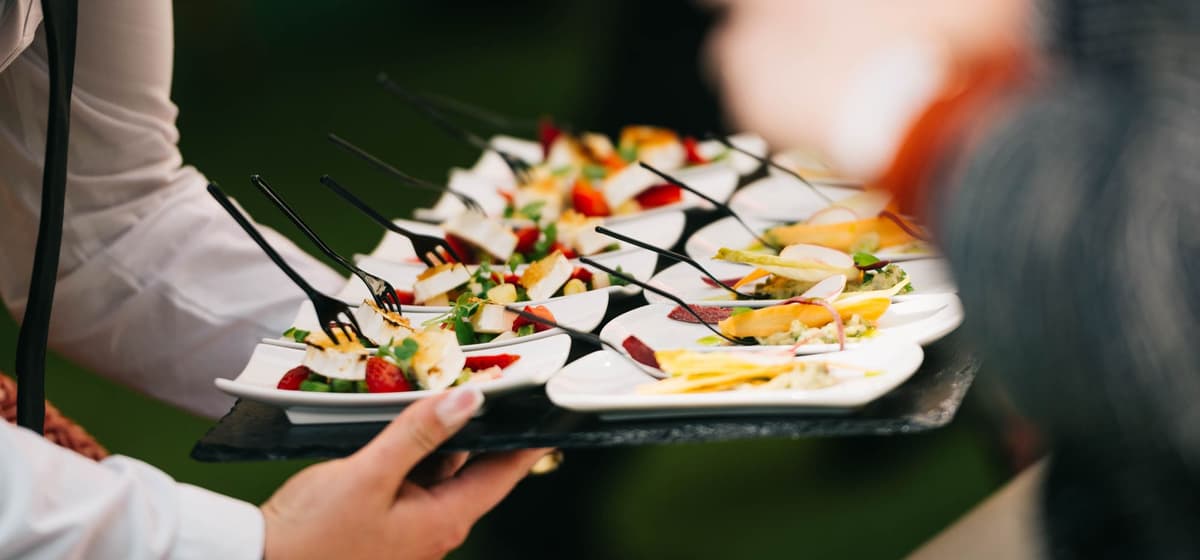 Canapés served on a slate tray at a function